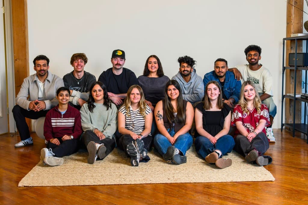 The 2nd Home For All team smiling together in a group photo